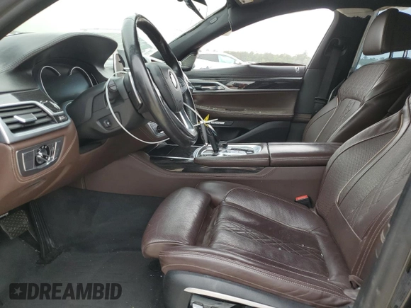 2017 BMW 7 Series 740i with VIN WBA7E2C37HG740680, listed as a Copart auction lot 45072763 with 76,828 mi miles. Bid and sale history available at carsss.com. Image 7.
