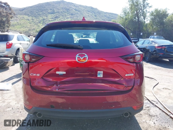 2019 Mazda CX-5 Sport with VIN JM3KFABM0K1633065, listed as a IAAI auction lot 41968786 with 90,407 mi miles and . Bid and sale history available at DreamBid. Image 16.