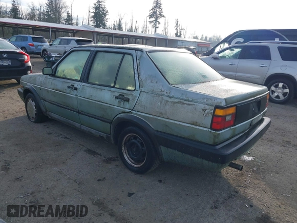 1991 Volkswagen Jetta z VIN 3VWRB21G1MM017401, wystawiony jako IAAI lot #41018295 z przebiegiem 206 316 mil mil oraz . Historia ofert i sprzedaży dostępna na DreamBid. Obrazek 3.