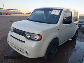 2009 Nissan Cube SL z VIN JN8AZ28R99T102860, wystawiony jako IAAI lot #42441475 z przebiegiem 151 466 mil mil oraz . Historia ofert i sprzedaży dostępna na DreamBid. Obrazek 2.