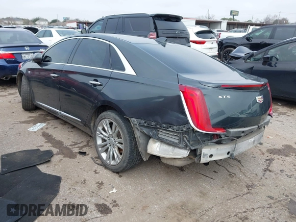 2018 Cadillac XTS Luxury with VIN 2G61M5S30J9164758, listed as a IAAI auction lot 41648265 with 173,134 mi miles and . Bid and sale history available at carsss.com. Image 3.