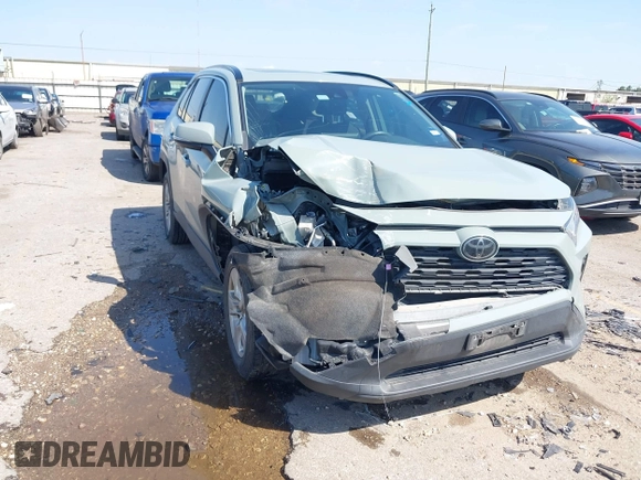 2019 Toyota RAV4 XLE with VIN JTMW1RFVXKD035994, listed as a IAAI auction lot 41868578 with 89,404 mi miles. Bid and sale history available at carsss.com. Image 1.