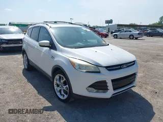 2015 Ford Escape Titanium with VIN 1FMCU0JX4FUB07322, listed as a IAAI auction lot 42220345 with 184,852 mi miles and . Bid and sale history available at DreamBid. Image 1.
