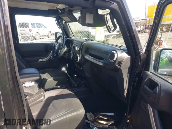 2015 Jeep Wrangler Unlimited Sahara with VIN 1C4BJWEGXFL506361, listed as a IAAI auction lot 41865418 with 80,841 mi miles. Bid and sale history available at carsss.com. Image 5.