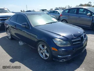 2014 Mercedes-Benz C-Class C 250 with VIN WDDGJ4HB1EG259318, listed as a IAAI auction lot 41817340 with 154,570 mi miles. Bid and sale history available at carsss.com. Image 1.