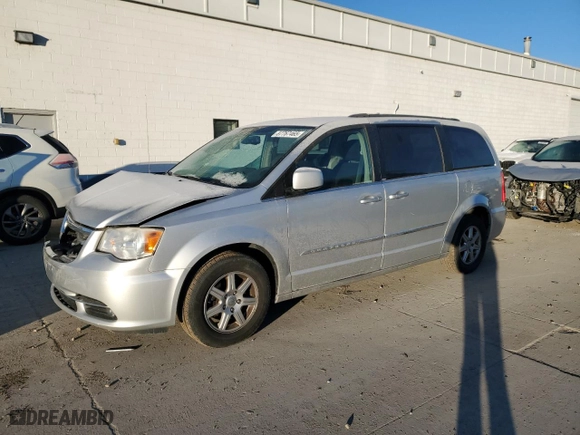 2012 Chrysler Town & Country Touring with VIN 2C4RC1BG8CR116233, listed as a Copart auction lot 87767465 with 144,472 mi miles and Salvage Title. Bid and sale history available at carsss.com. Image 1.
