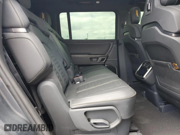 2022 Rivian R1S Launch Edition z VIN 7PDSGABL5NN001018, wystawiony jako Copart lot #56914725 z przebiegiem 26 156 mil mil oraz Szkoda całkowita • Salvage title. Historia ofert i sprzedaży dostępna na DreamBid. Obrazek 11.