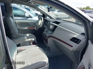 2014 Toyota Sienna XLE with VIN 5TDYK3DC2ES448876, listed as a IAAI auction lot 42519351 with 154,601 mi miles and . Bid and sale history available at DreamBid. Image 5.