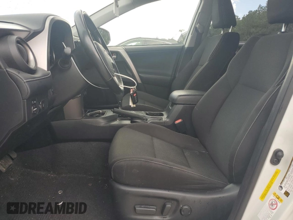 2018 Toyota RAV4 XLE with VIN JTMWFREV0JJ204150, listed as a Copart auction lot 59610825 with 34,730 mi miles and Salvage title. Bid and sale history available at DreamBid. Image 7.