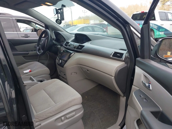 2016 Honda Odyssey SE with VIN 5FNRL5H39GB155488, listed as a IAAI auction lot 41702336 with 122,164 mi miles. Bid and sale history available at carsss.com. Image 5.