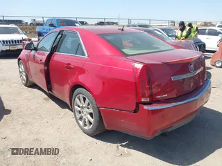 2008 Cadillac CTS RWD w/1SB with VIN 1G6DV57V980213836, listed as a IAAI auction lot 42006005 with 124,596 mi miles. Bid and sale history available at carsss.com. Image 3.