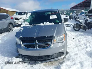 2017 Dodge Grand Caravan SE Plus z VIN 2C4RDGBG7HR789747, wystawiony jako IAAI lot #41289595 z przebiegiem 89 577 mil mil oraz . Historia ofert i sprzedaży dostępna na DreamBid. Obrazek 13.