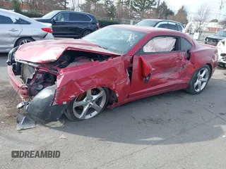 2014 Chevrolet Camaro LT z VIN 2G1FC1E31E9291298, wystawiony jako IAAI lot #41405239 z przebiegiem 122 688 mil mil oraz . Historia ofert i sprzedaży dostępna na DreamBid. Obrazek 2.