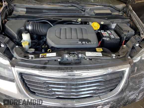2015 Chrysler Town & Country S with VIN 2C4RC1HG6FR753990, listed as a Copart auction lot 84956404 with 183,637 mi miles and Salvage Title. Bid and sale history available at DreamBid. Image 12.