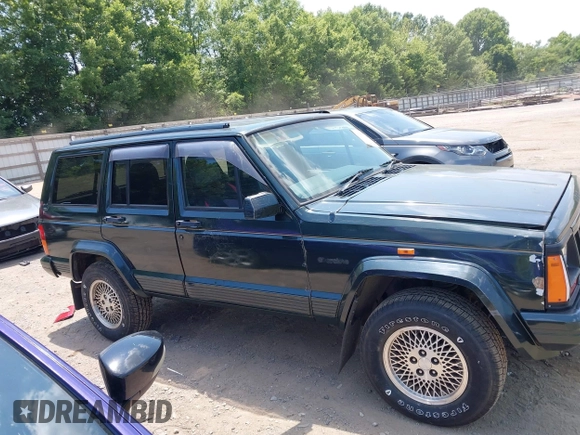 1995 Jeep Cherokee with VIN 1J4FN78S1SL640692, listed as a IAAI auction lot 42577079 with 232,087 mi miles and . Bid and sale history available at DreamBid. Image 13.