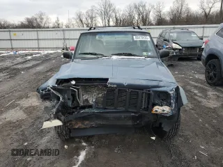 1999 Jeep Cherokee SE with VIN 1J4FF28S9XL576313, listed as a Copart auction lot 88470435 with Not provided miles and Salvage title. Bid and sale history available at DreamBid. Image 5.