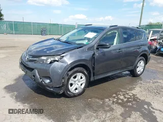 2015 Toyota RAV4 LE with VIN JTMBFREV2FD104409, listed as a IAAI auction lot 42084145 with 102,948 mi miles and . Bid and sale history available at DreamBid. Image 2.