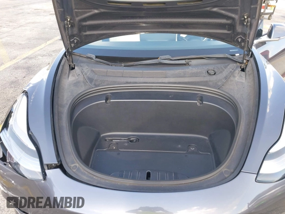2020 Tesla Model 3 Standard Range Plus with VIN 5YJ3E1EA0LF744046, listed as a IAAI auction lot 41939894 with 102,576 mi miles. Bid and sale history available at carsss.com. Image 10.