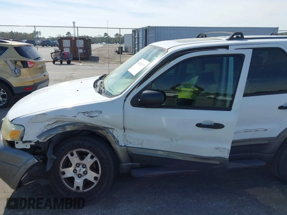 2005 Ford Escape XLT with VIN 1FMYU03165KA93495, listed as a IAAI auction lot 41821975 with 202,475 mi miles and . Bid and sale history available at DreamBid. Image 6.