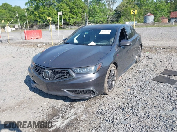 2019 Acura TLX w/A-Spec Pkg z VIN 19UUB2F62KA006920, wystawiony jako IAAI lot #42039137 z przebiegiem 102 780 mil mil oraz . Historia ofert i sprzedaży dostępna na DreamBid. Obrazek 2.