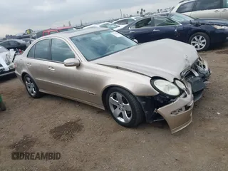 2005 Mercedes-Benz E-Class 3.2L with VIN WDBUF65J25A614469, listed as a IAAI auction lot 41521864 with 90,403 mi miles. Bid and sale history available at carsss.com. Image 1.