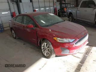 2019 Ford Fusion Hybrid SE with VIN 3FA6P0LUXKR205712, listed as a IAAI auction lot 41267049 with 124,687 mi miles. Bid and sale history available at carsss.com. Image 1.