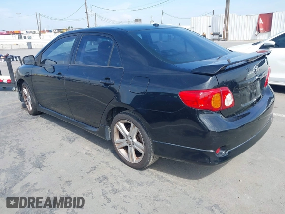 2009 Toyota Corolla XRS with VIN 1NXBE40EX9Z100623, listed as a IAAI auction lot 42032138 with 183,901 mi miles. Bid and sale history available at carsss.com. Image 3.
