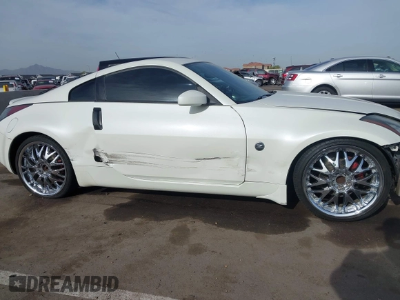 2004 Nissan 350Z Touring with VIN JN1AZ34D14M102966, listed as a IAAI auction lot 41921270 with 182,633 mi miles. Bid and sale history available at carsss.com. Image 6.