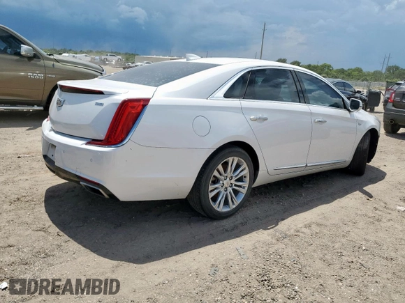 2018 Cadillac XTS Luxury with VIN 2G61M5S31J9124558, listed as a Copart auction lot 62873275 with 142,727 mi miles and Salvage title. Bid and sale history available at DreamBid. Image 3.