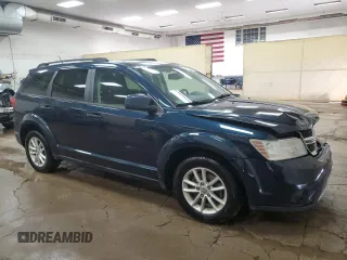 2013 Dodge Journey SXT with VIN 3C4PDDBG2DT519239, listed as a Copart auction lot 61682615 with 248,833 mi miles and Clean title. Bid and sale history available at DreamBid. Image 4.