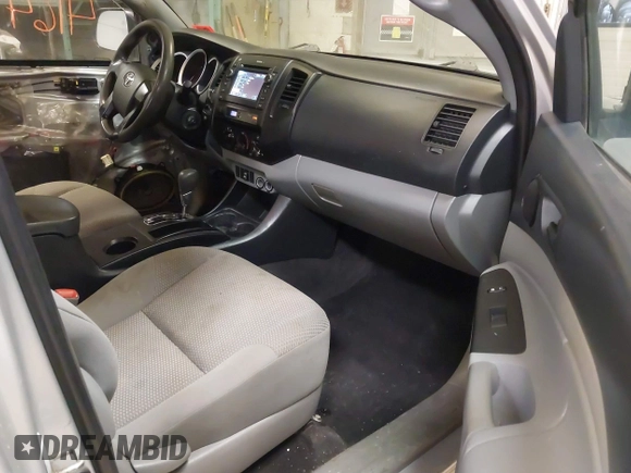 2013 Toyota Tacoma with VIN 5TFUU4EN0DX071116, listed as a IAAI auction lot 41647546 with 243,898 mi miles and . Bid and sale history available at DreamBid. Image 5.