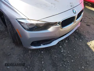 2016 BMW 3 Series 320i with VIN WBA8E1G52GNT35914, listed as a IAAI auction lot 41776031 with 156,193 mi miles and . Bid and sale history available at carsss.com. Image 6.