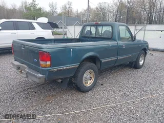 1995 Ford Ranger XLT with VIN 1FTCR10X9STA67218, listed as a IAAI auction lot 41952953 with 230,733 mi miles. Bid and sale history available at carsss.com. Image 4.