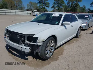 2016 Chrysler 300 Anniversary Edition with VIN 2C3CCAAG7GH313739, listed as a IAAI auction lot 41833824 with 285,806 mi miles and . Bid and sale history available at DreamBid. Image 2.