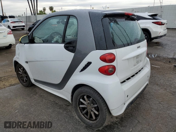 2014 Smart fortwo Pure with VIN WMEEJ3BAXEK745569, listed as a Copart auction lot 48601055 with 114,673 mi miles and Salvage title. Bid and sale history available at DreamBid. Image 2.