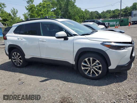 2023 Toyota Corolla Cross XLE with VIN 7MUDAABGXPV060797, listed as a Copart auction lot 62110665 with 18,293 mi miles and Salvage title. Bid and sale history available at DreamBid. Image 4.