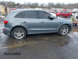 2016 Audi Q5 Premium Plus z VIN WA1D7AFP9GA112477, wystawiony jako IAAI lot #41520842 z przebiegiem 132 497 mil mil oraz . Historia ofert i sprzedaży dostępna na DreamBid. Obrazek 13.