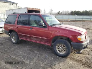 2001 Ford Explorer XLS with VIN 1FMZU72E91ZA36467, listed as a Copart auction lot 43222375 with 138,058 mi miles and Salvage title. Bid and sale history available at DreamBid. Image 4.