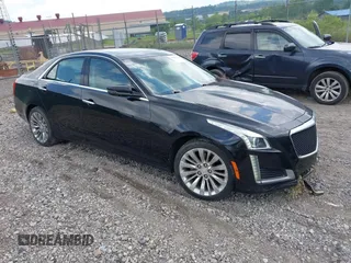 2016 Cadillac CTS Luxury Collection AWD z VIN 1G6AX5SX0G0102404, wystawiony jako IAAI lot #42687067 z przebiegiem 157 660 mil mil oraz . Historia ofert i sprzedaży dostępna na DreamBid. Obrazek 1.