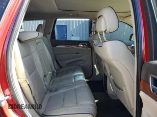 2011 Jeep Grand Cherokee Overland with VIN 1J4RR6GT8BC606688, listed as a Copart auction lot 57182295 with 100,423 mi miles and Salvage title. Bid and sale history available at DreamBid. Image 11.