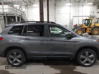 2019 Honda Passport Touring with VIN 5FNYF8H98KB007933, listed as a IAAI auction lot 41953263 with 87,614 mi miles and . Bid and sale history available at DreamBid. Image 13.