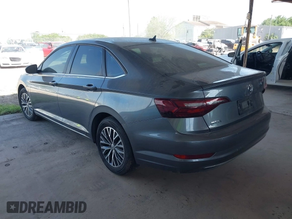 2021 Volkswagen Jetta S z VIN 3VWC57BU0MM028310, wystawiony jako IAAI lot #41938979 z przebiegiem 61 056 mil mil oraz . Historia ofert i sprzedaży dostępna na DreamBid. Obrazek 3.