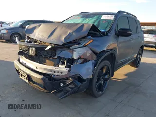 2019 Honda Passport Elite z VIN 5FNYF8H07KB015720, wystawiony jako IAAI lot #41221298 z przebiegiem 65 747 mil mil oraz . Historia ofert i sprzedaży dostępna na DreamBid. Obrazek 2.