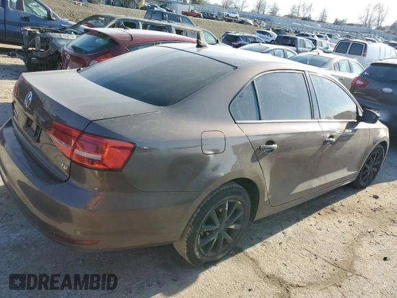2015 Volkswagen Jetta SE with VIN 3VWD17AJ9FM283810, listed as a Copart auction lot 43255024 with 135,067 mi miles and Salvage title. Bid and sale history available at DreamBid. Image 3.