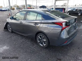 2022 Toyota Prius L Eco with VIN JTDKAMFU7N3155268, listed as a IAAI auction lot 41589024 with 158,430 mi miles. Bid and sale history available at carsss.com. Image 3.