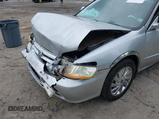 2002 Honda Accord SE z VIN 1HGCG56792A109226, wystawiony jako IAAI lot #42155995 z przebiegiem 238 789 mil mil oraz . Historia ofert i sprzedaży dostępna na DreamBid. Obrazek 6.