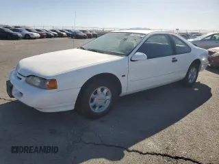 1995 Ford Thunderbird LX z VIN 1FALP62W0SH215286, wystawiony jako Copart lot #54630155 z przebiegiem 43 886 mil mil oraz Szkoda całkowita • Salvage title. Historia ofert i sprzedaży dostępna na DreamBid. Obrazek 1.