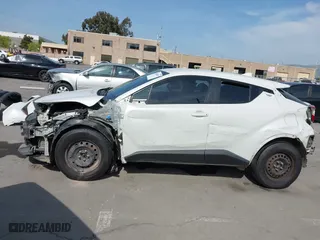 2018 Toyota C-HR XLE with VIN NMTKHMBX4JR049041, listed as a IAAI auction lot 42038397 with 74,930 mi miles. Bid and sale history available at carsss.com. Image 15.