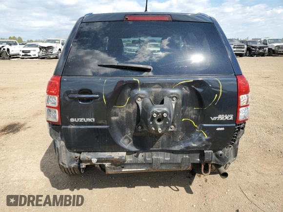 2008 Suzuki Grand Vitara Luxury z VIN JS3TD947784101653, wystawiony jako Copart lot #55773325 z przebiegiem 156 227 mil mil oraz Szkody całkowita. Historia ofert i sprzedaży dostępna na DreamBid. Obrazek 6.