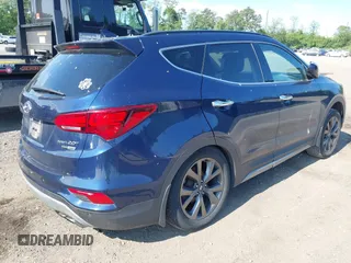 2018 Hyundai Santa Fe Ultimate with VIN 5XYZWDLA3JG571432, listed as a IAAI auction lot 42395245 with 69,330 mi miles and . Bid and sale history available at DreamBid. Image 4.